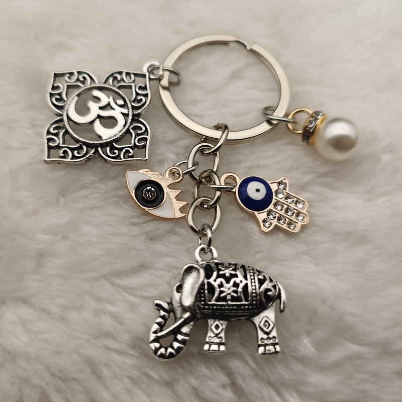 Vintage Religious Keychain Ele - مراجعة Vintage Ysl Fashion وسعره